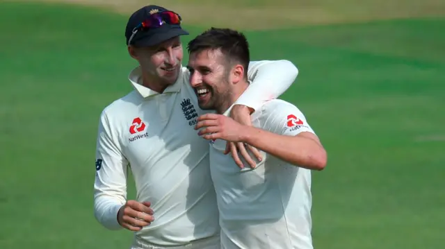 Joe Root and Mark Wood