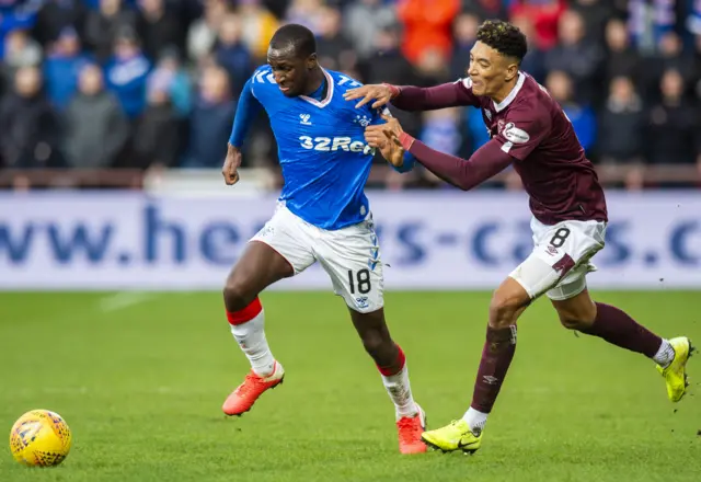 Hearts’ Glen Kamara (left) vies for possession with Hearts’ Sean Clare