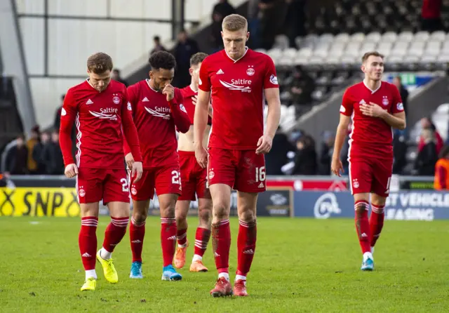 Aberdeen players leave the pitch after their 0-0 draw with St Mirren