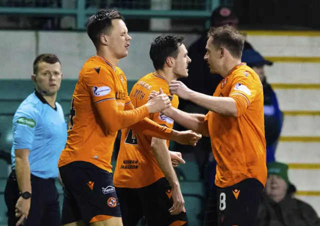 United celebrate a glorious opening goal from Lawrence Shankland