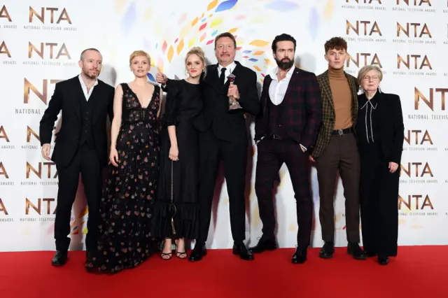 Anthony Byrne, Kate Philips, Sophie Rundle, Steven Knight, Emmett J. Scanlan, Harry Kirton and guest, accepting the Best Drama award for "Peaky Blinders"