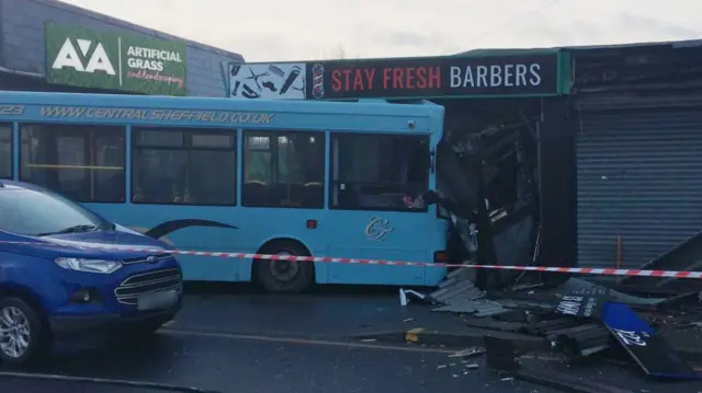 A bus in a barbers shop