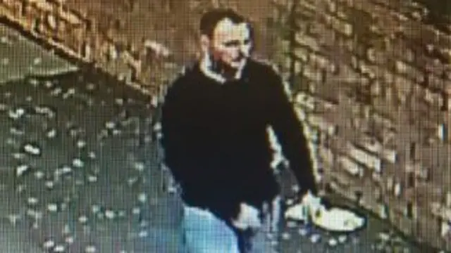 A CCTV image of a man