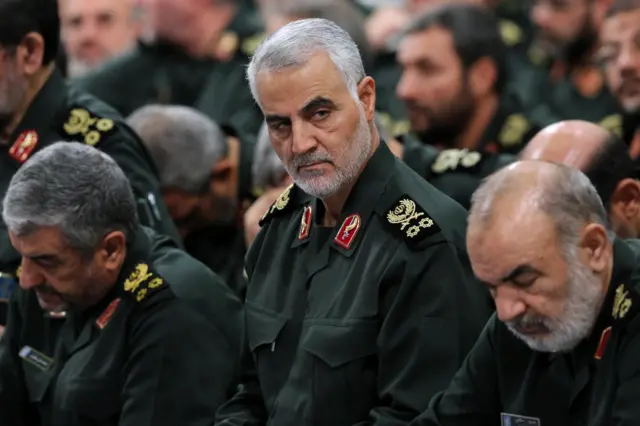 Qasem Soleimani (C) attends a meeting with Iranian supreme leader Ayatollah Ali Khamenei (not pictured) in Tehran on 18 September 2018.