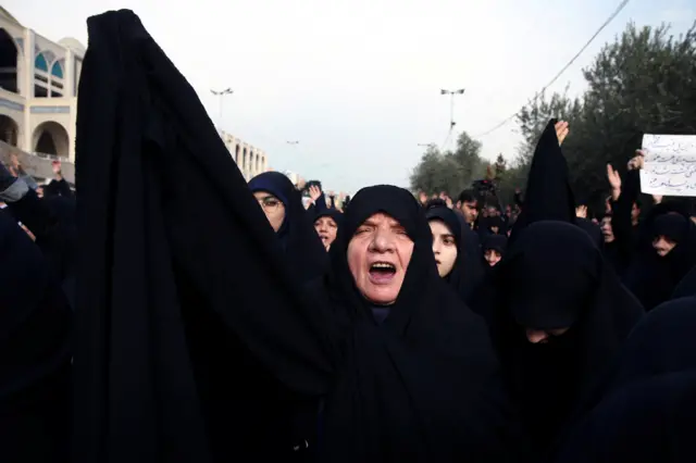 People chant slogans during a protest against the killing of Qassem Soleimani and Abu Mahdi al-Muhandis in Tehran on 3 January, 2020.