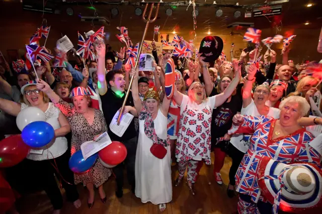 Brexit supporters mark the moment the UK leaves the EU at Woolston Social Club in Warrington