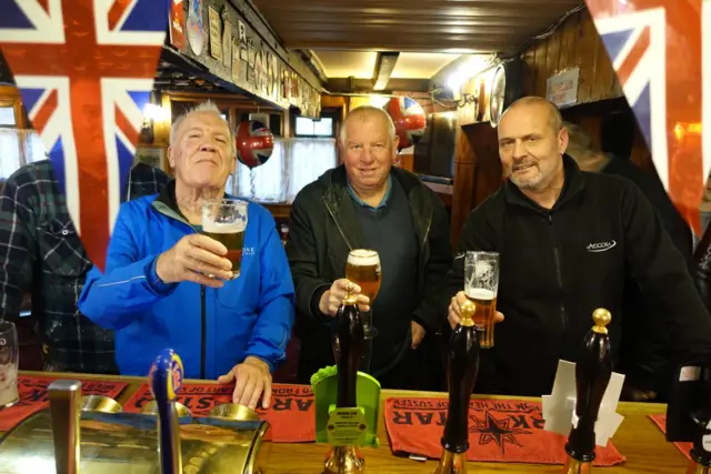 Revelers in Gravesend pub