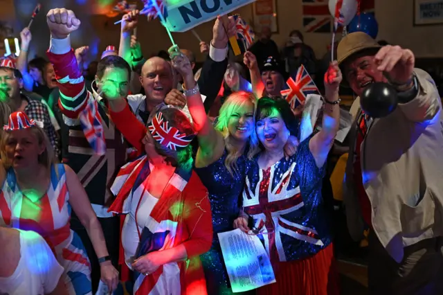 Brexit supporters mark the moment the UK leaves the EU at Woolston Social Club in Warrington