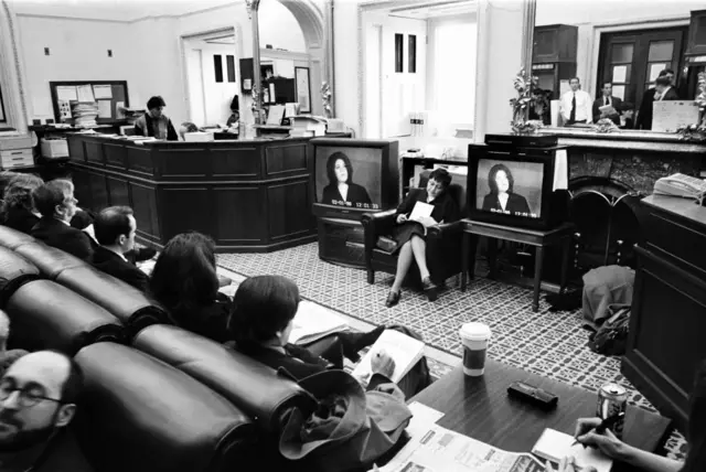 A group of reporters listen remotely to the testimony of Monica Lewinsky during the Clinton Impeachment Trial in the Senate on Feb 6, 1999