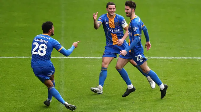 Shrewsbury celebrating their goal