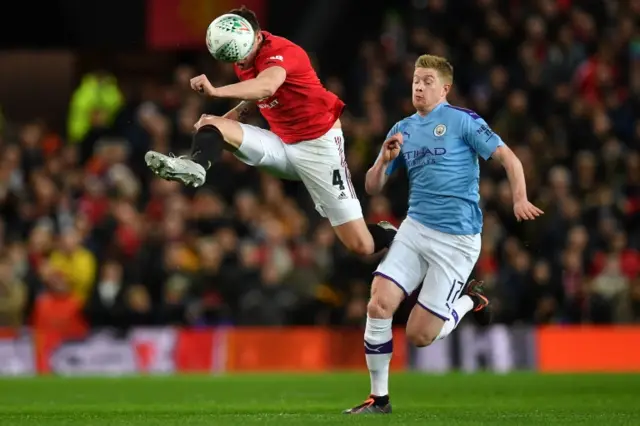 Phil Jones (left) and Kevin de Bruyne