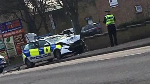 A damaged police car