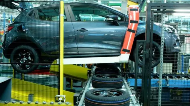 Car being manufactured