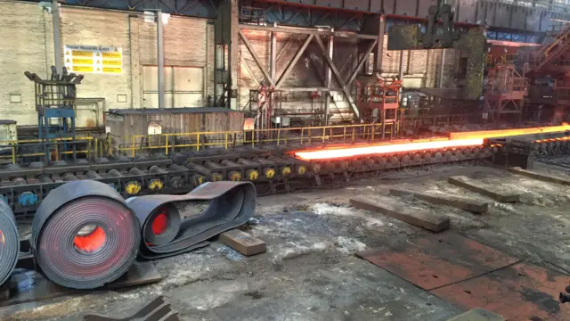 Steel being rolled at a steelworks