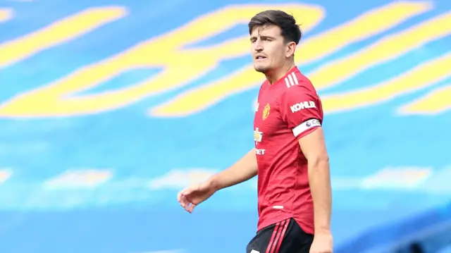 Harry Maguire playing for Manchester United