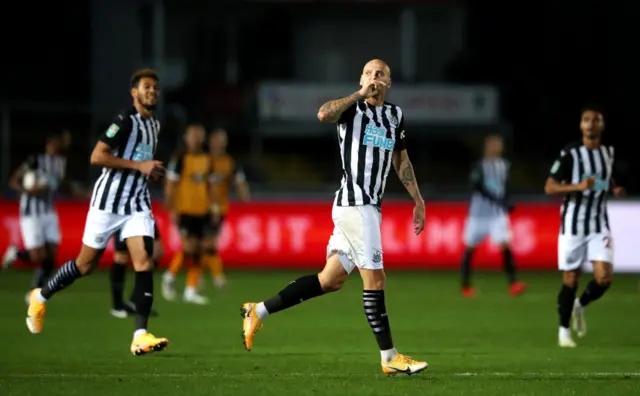 Jonjo Shelvey celebrating his equaliser against Newport