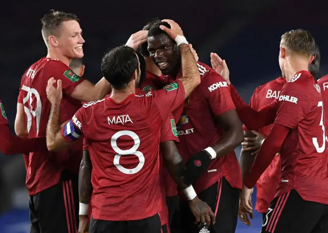 Man Utd players celebrate after Paul Pogba's goal