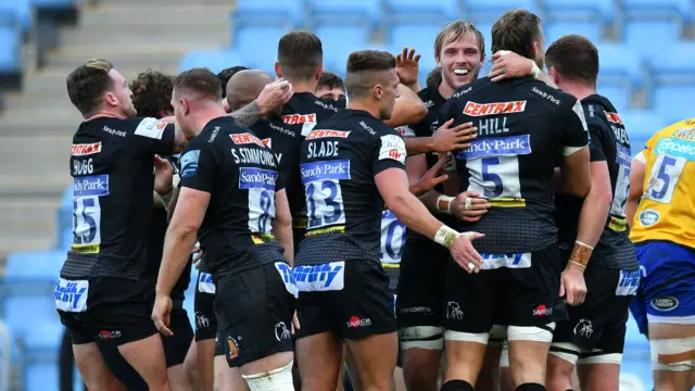 Exeter celebrate a try