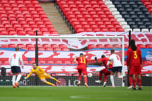 Romelu Lukaku scores from the penalty spot against England