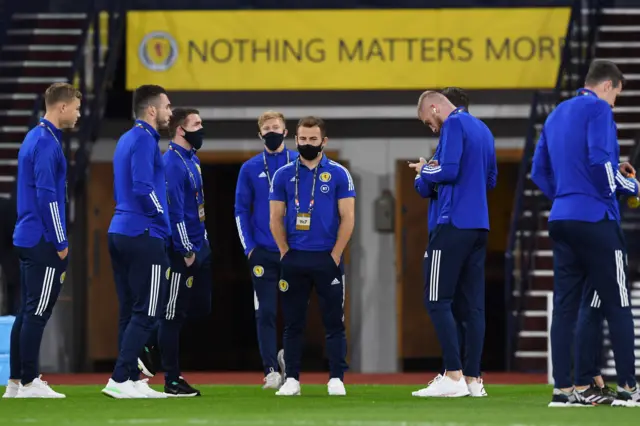 The Scotland players check out the Hampden turf before kick off