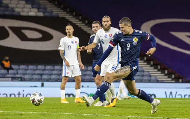 Lyndon Dykes bangs in the only goal at Hampden