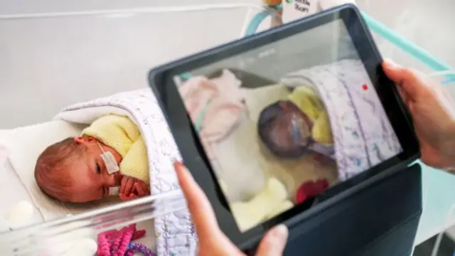 FaceTiming new born baby in hospital