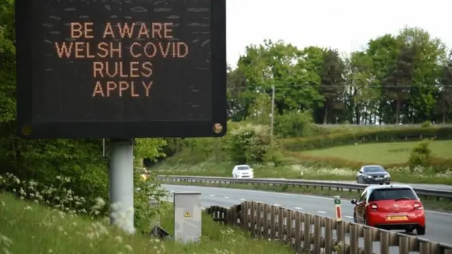 A road sign on the English/Welsh border