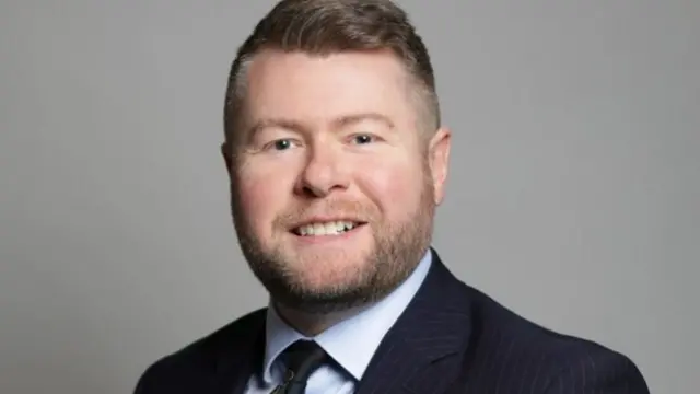 MP Damien Moore