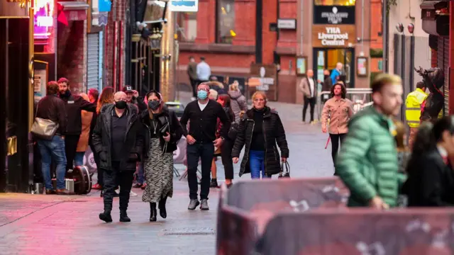 People in masks in Liverpool