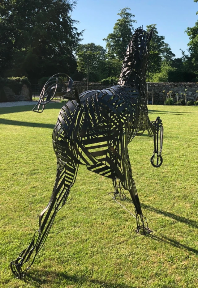 Metal horse sculpture