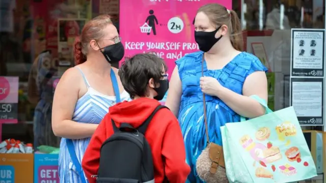 Masked people in Leicester