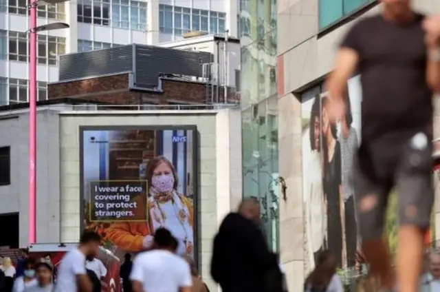 Billboard offering face covering advice in Birmingham