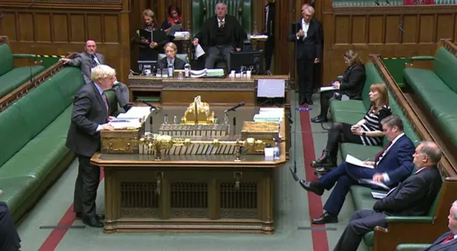 Boris Johnson facing Keir Starmer at PMQs