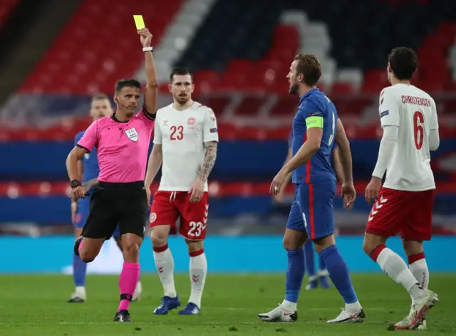 Andreas Christensen is shown a yellow card