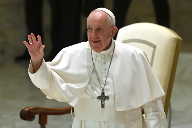 Pope Francis waves during his weekly general audience in the Paul VI hall at the Vatican on October 14, 2020