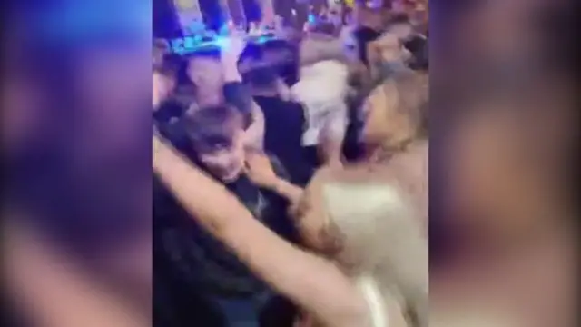 Social media images of crowds dancing in Liverpool