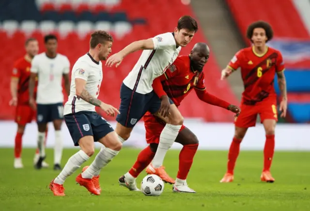 Harry Maguire playing for England against Belgium