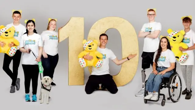 Matt Baker and six young people involved in the Rickshaw Challenge