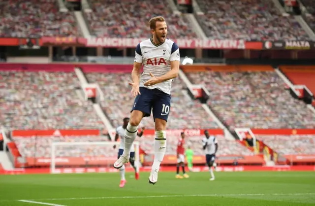 Harry Kane celebrates scoring against Manchester United