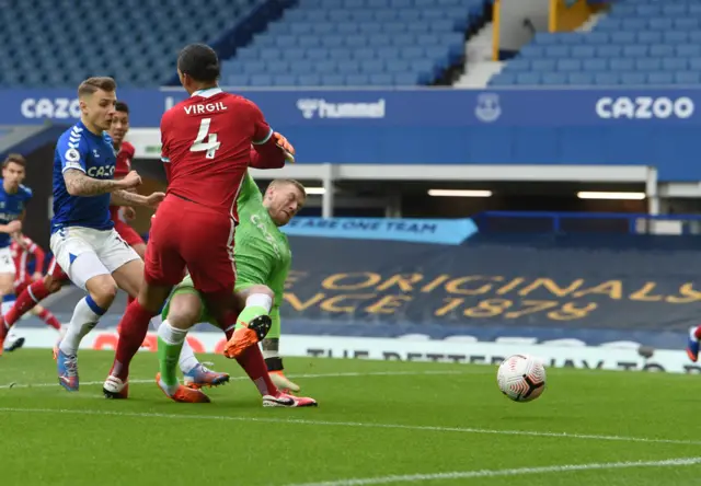 Jordan Pickford challenge on Virgil van Dijk