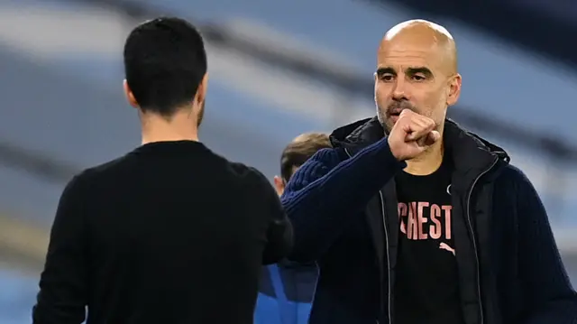 Pep Guardiola and Mikel Arteta