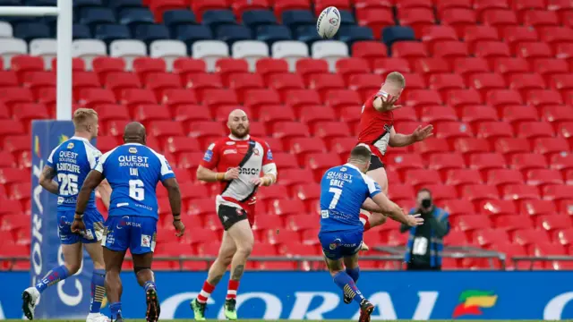 Luke Gale kicks a drop-goal