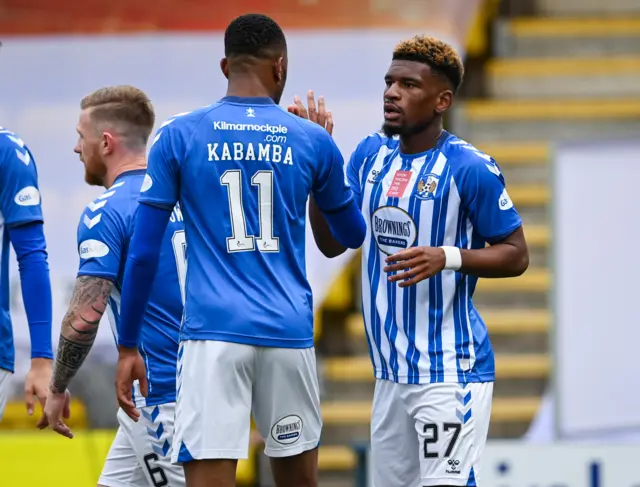 Aaron Tshibola (right) tapped in after Chris Burke's shot was saved.