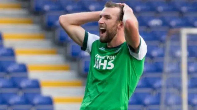 Hibs striker Christian Doidge laments a late chance