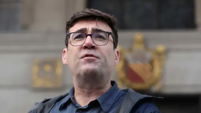 Greater Manchester mayor Andy Burnham speaking to the media outside the Central Library in Manchester, he has threatened legal action if Tier 3 restrictions are imposed without agreement.