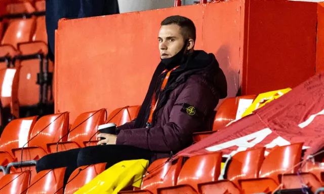 Former Celtic midfielder Liam Burt in the Pittodrie stand