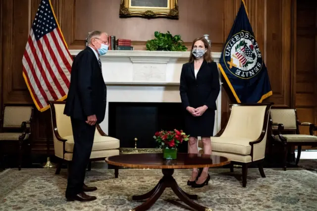 Amy Coney Barrett and Senator James Inhofe