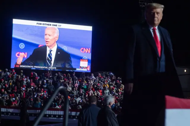 Trump watches a video of Biden at a campaign rally