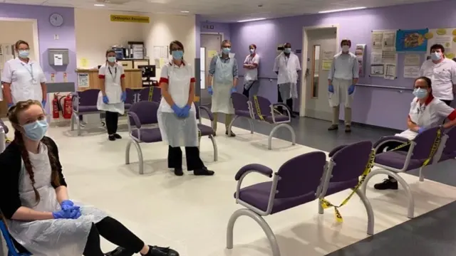 Staff in face masks at hospital