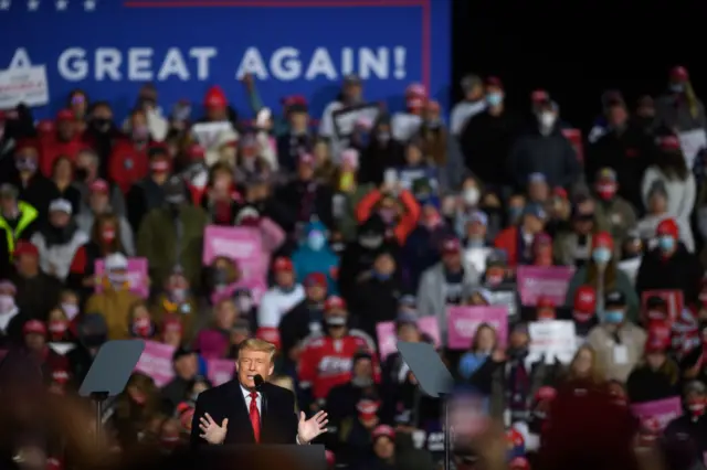 President Donald Trump speaks to supporters at a campaign rally at North Coast Air aeronautical services at Erie International Airport on October 20, 2020 in Erie, Pennsylvania